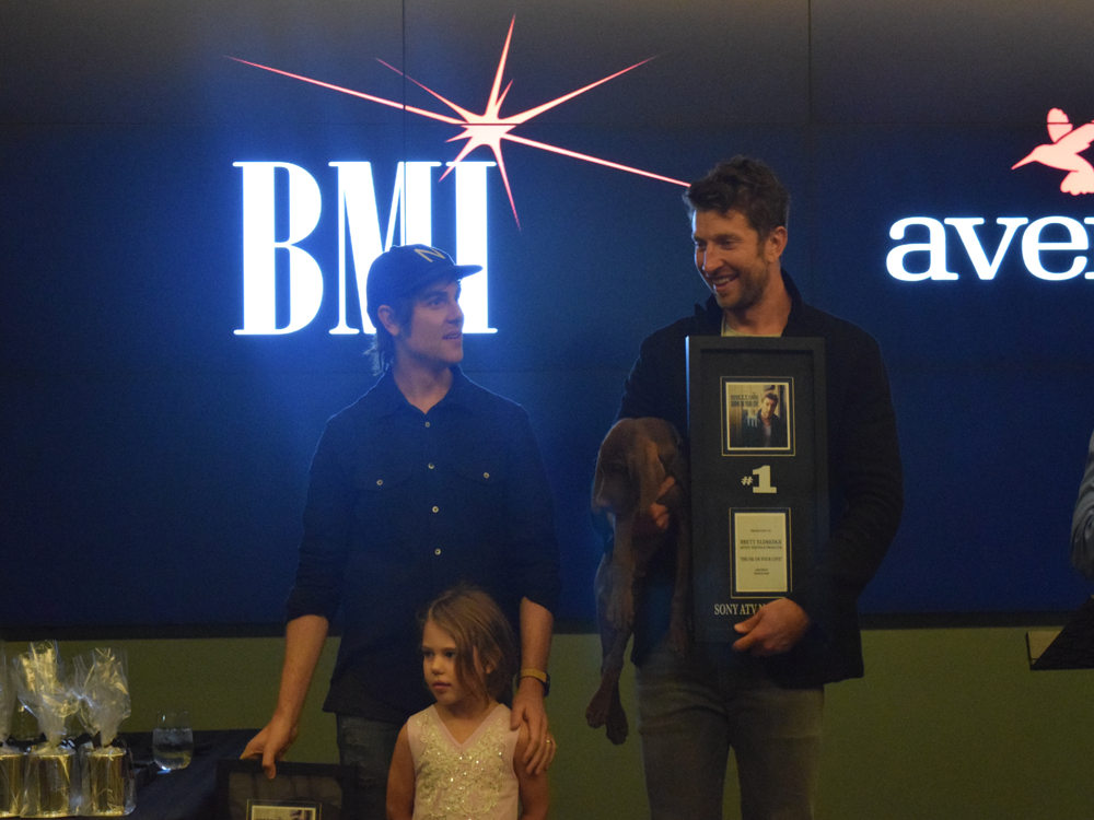 Brett Eldredge Celebrates No. 1 Party for “Drunk on Your Love” With Family, Friends & Edgar [the Puppy]