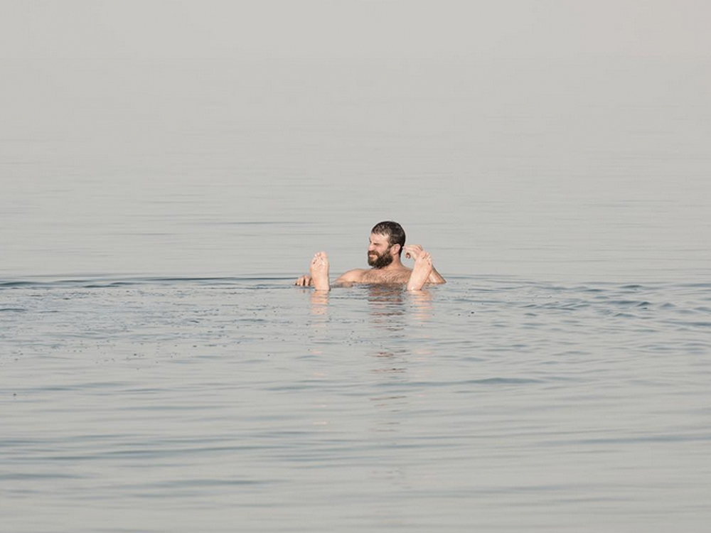 Sam Hunt Recharges Batteries With a Float in the Dead Sea